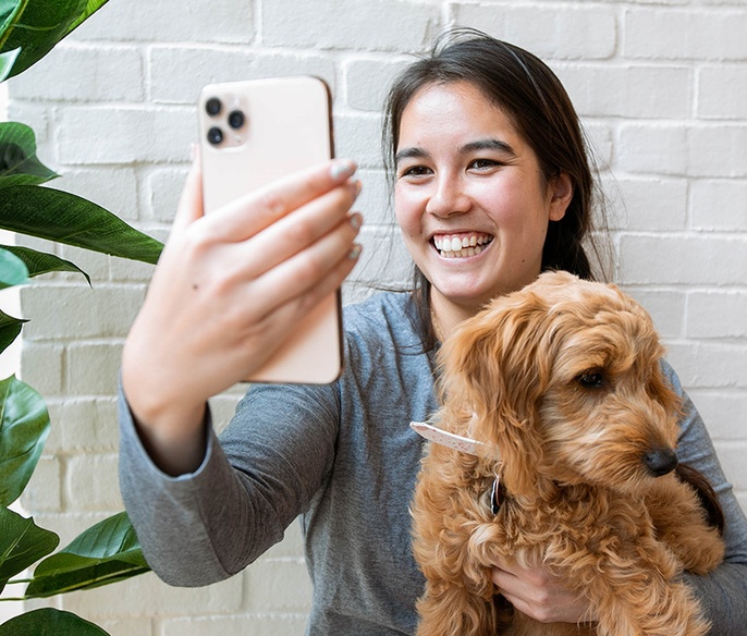 Pet parent in clinic lobby